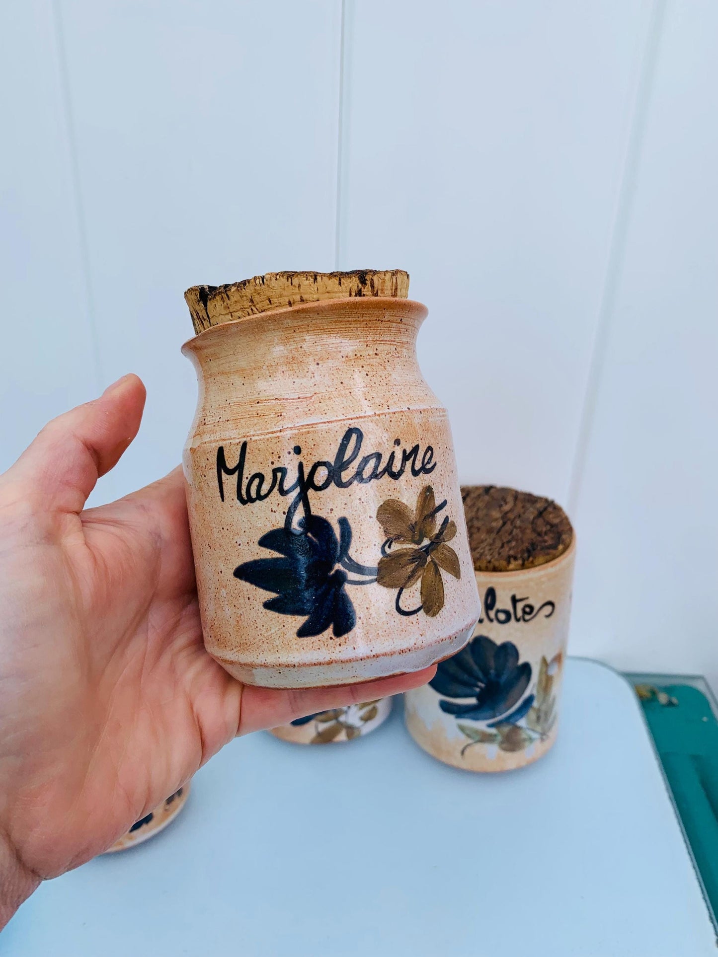 Set of 4 Pottery Canisters with Hand Painted Designs with Cork Tops