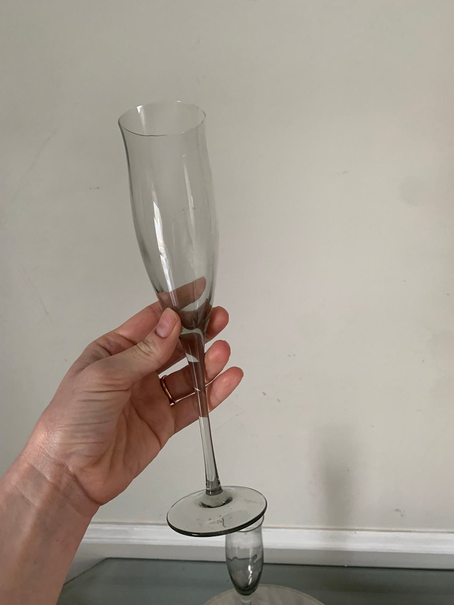 Pair of Vintage Tall Smokey Gray Glass Champagne Flutes with Flared Lip