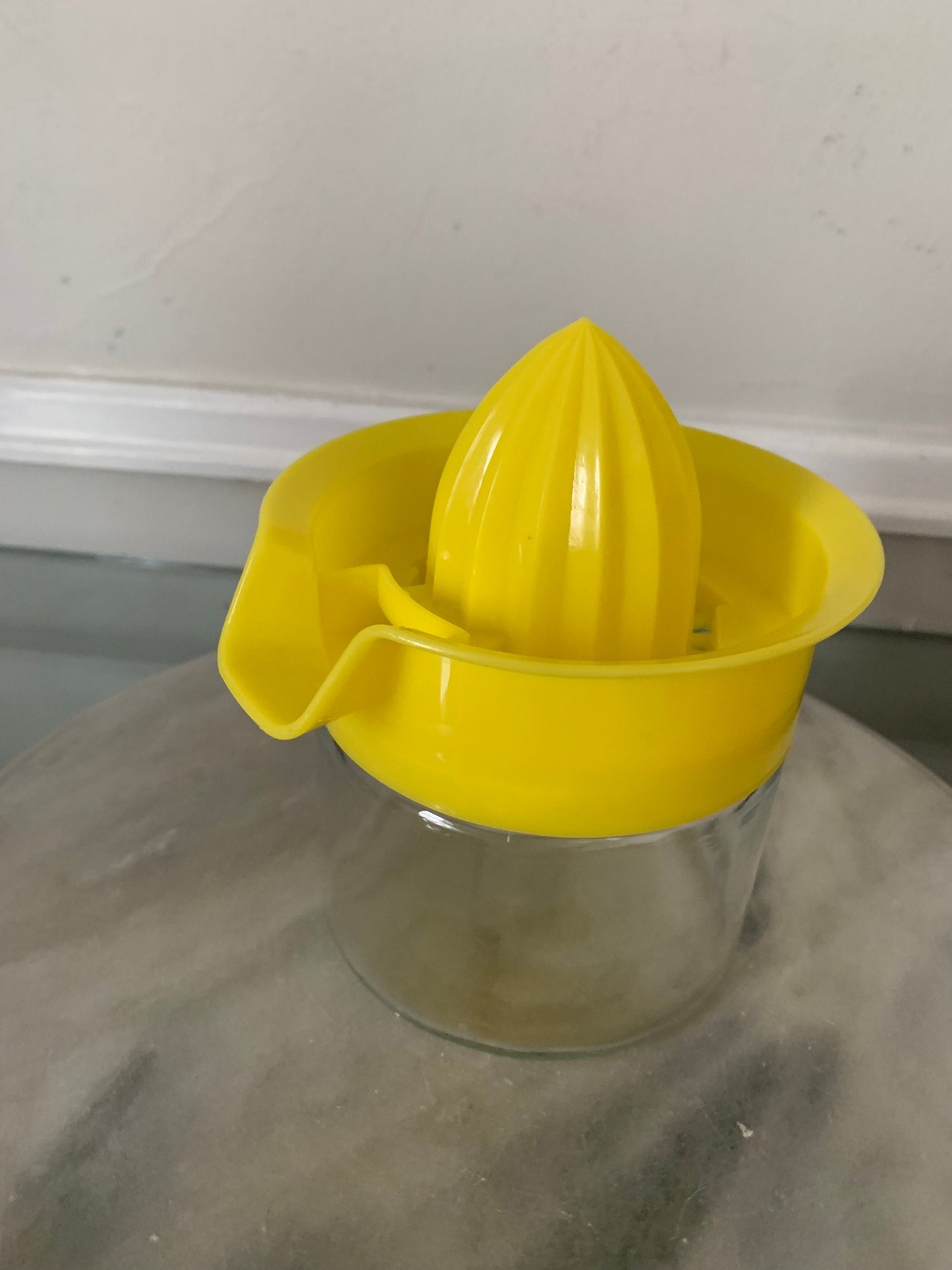 MCM Yellow Plastic and Glass Lidded Juicer