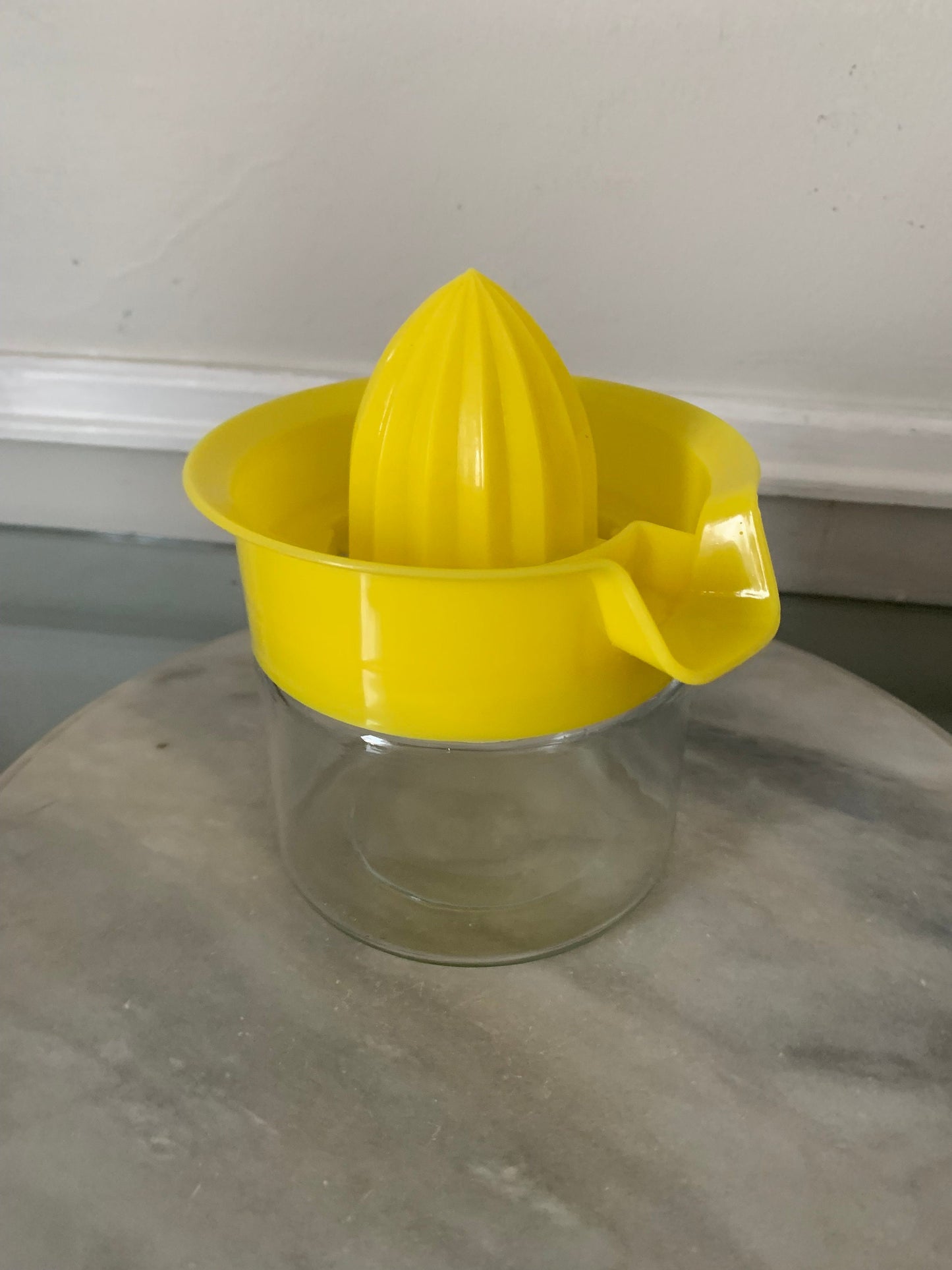 MCM Yellow Plastic and Glass Lidded Juicer