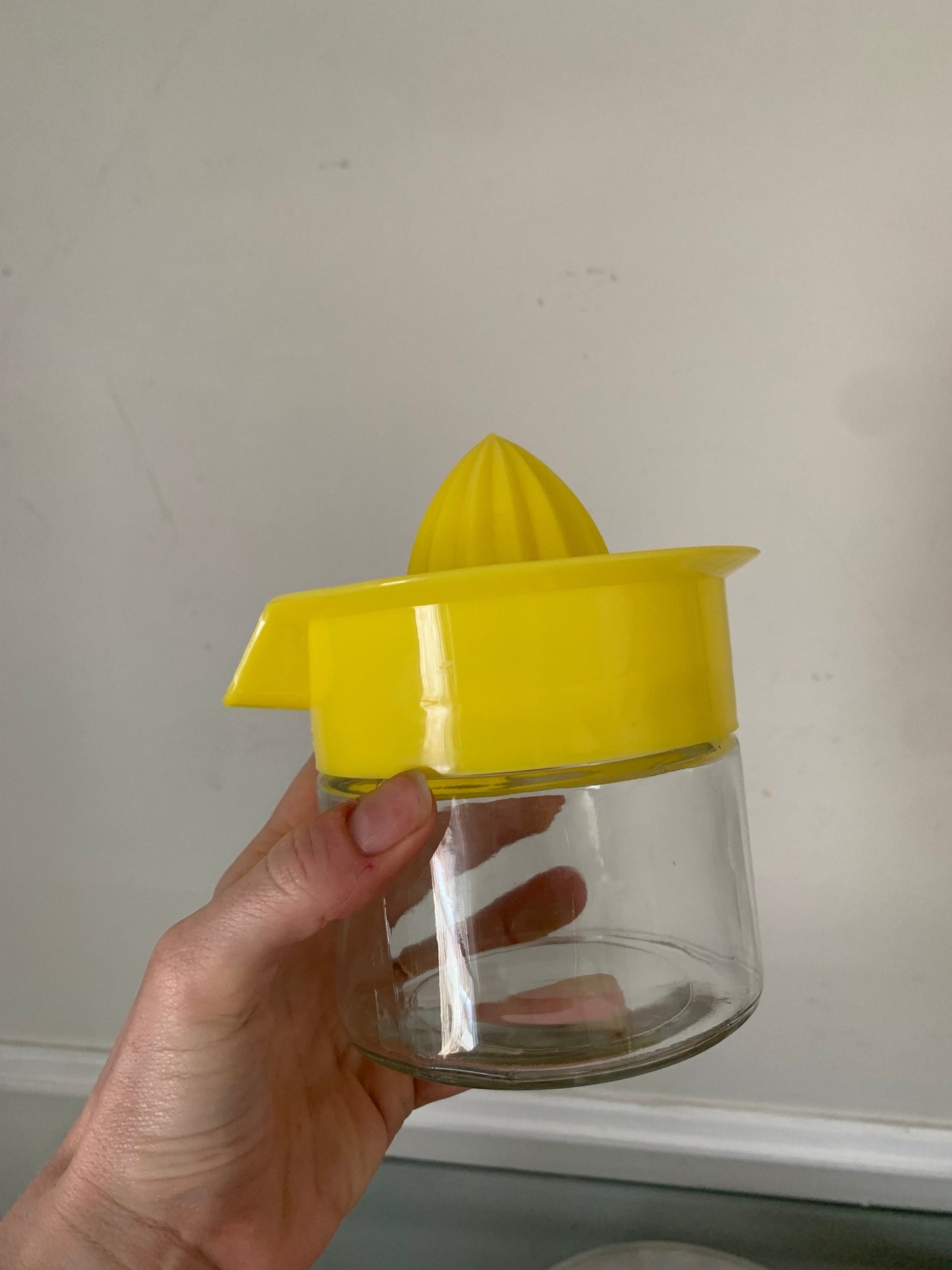 MCM Yellow Plastic and Glass Lidded Juicer