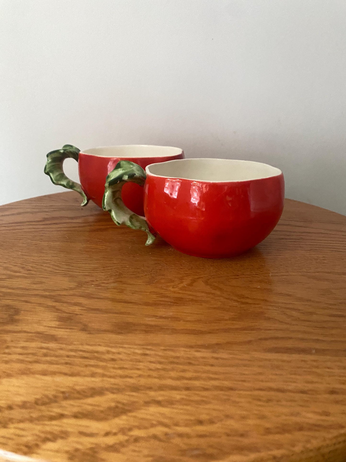 Pair of Vintage Holt Howard (1962) Hand Painted Bright Orange Tomato Cup with Leaf Handle