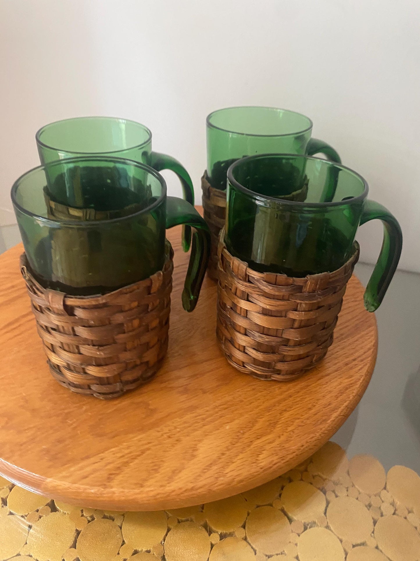 Set of 4 Vintage Emerald Green Glass Mugs with Applied Handle and Woven Caddy