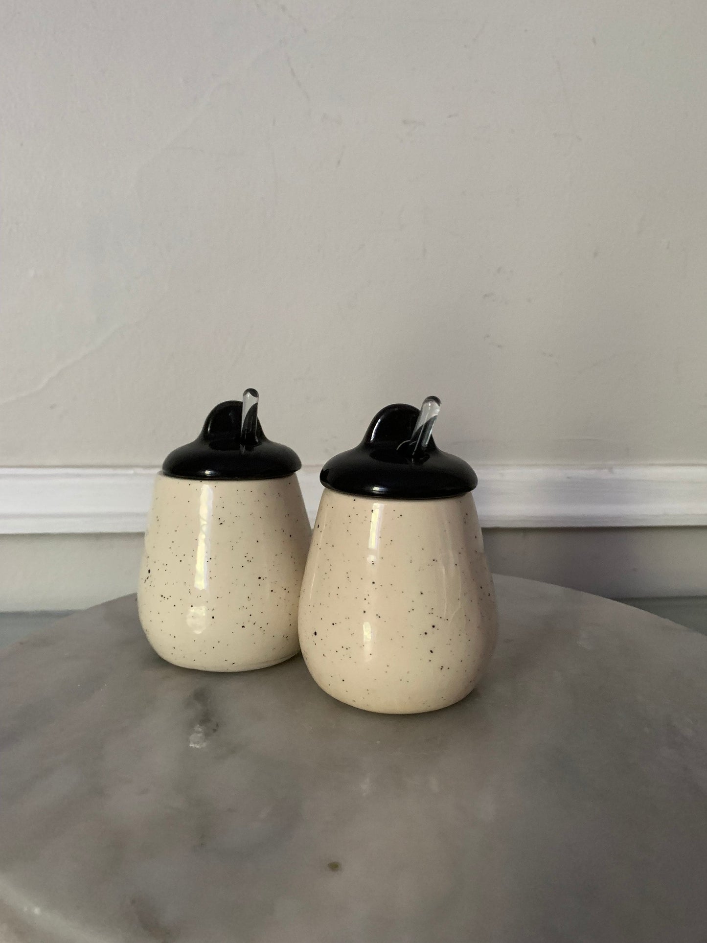 MCM Pair of Speckled White Ceramic Jars with Black Lid with Clear Glass Spoons